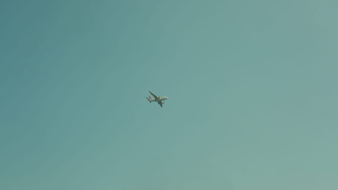 Some pictures of the sky with a plane or a bird